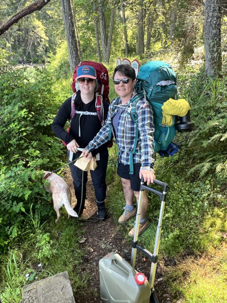 image of two people hiking on Portland island